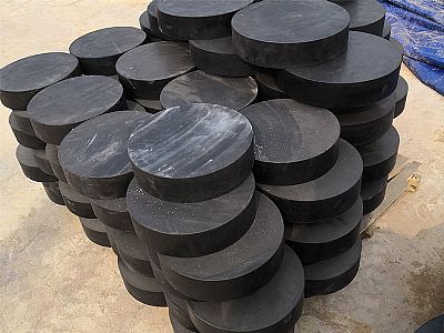 商洛板式橡胶支座由若干层橡胶片与薄钢板经加压硫化